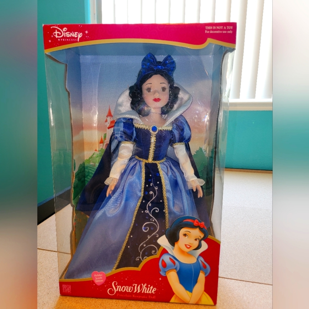 Disney's Snowwhite Porcelain Keepsake Doll.